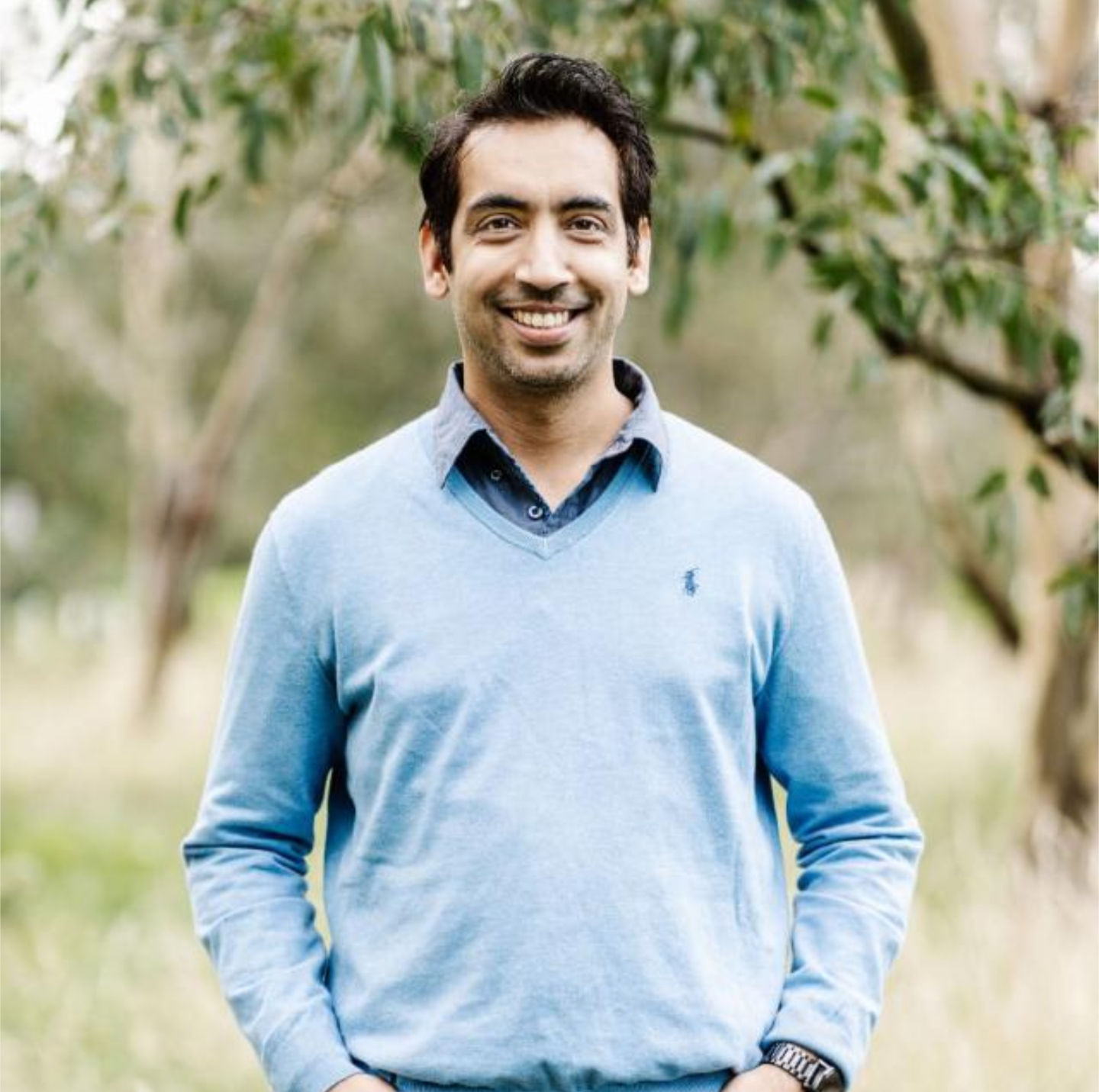 Mohit Gulati - Casual outdoor photo in light blue v-neck sweater